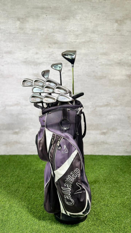 Golf club set with Calliope branding on a green surface and gray background