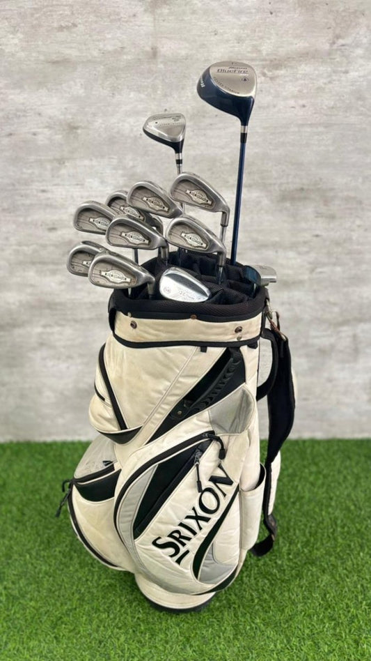Srixon golf clubs in a white and black bag on a green and gray background